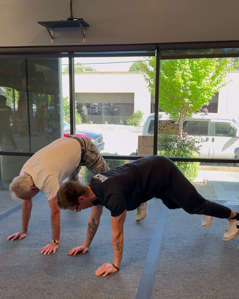 Ritual Training Portland - members working through floor mobility in a coached session