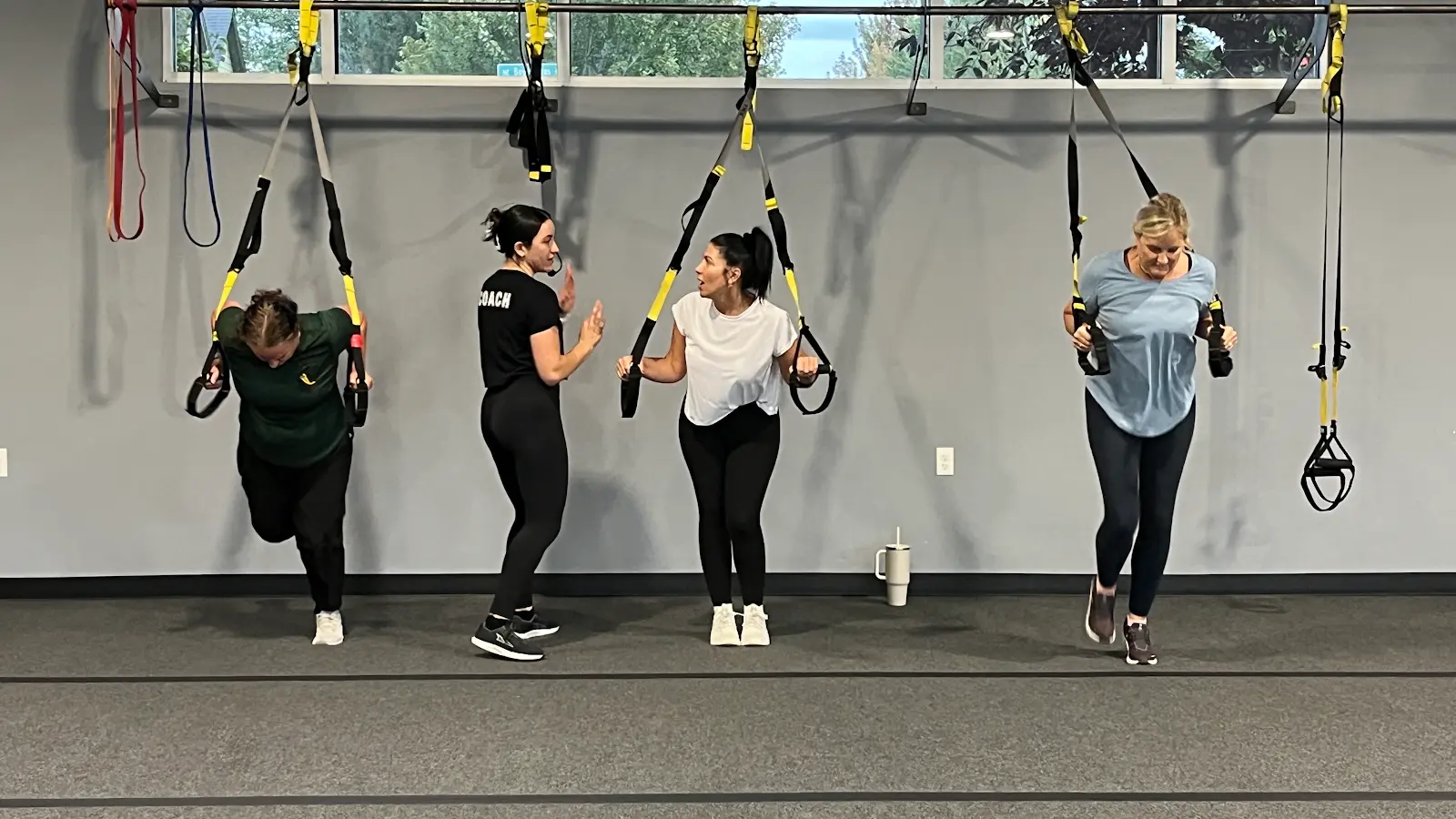 A small group training on suspension straps
