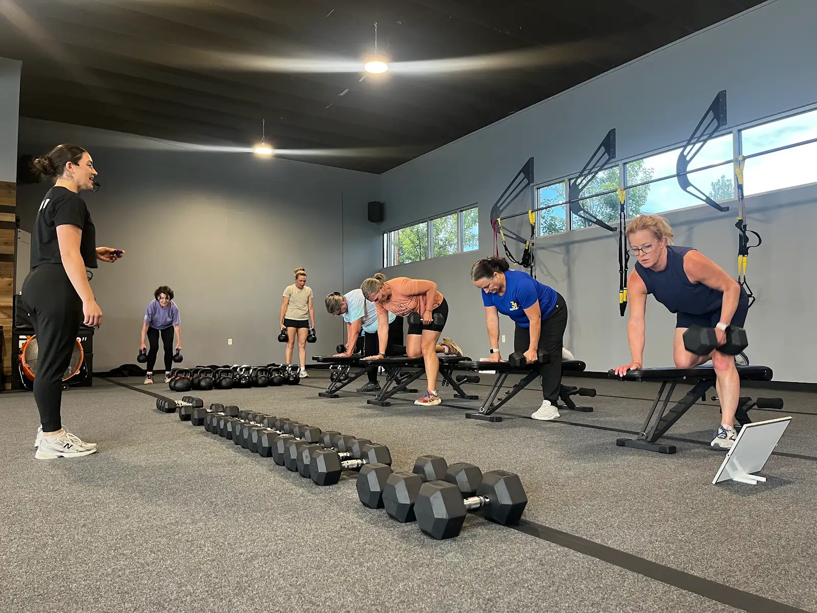 Benches and dumbbells set out before a session